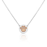 A sterling silver necklace with a paw print pendant in rose gold vermeil.